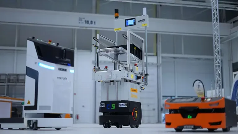 Autonomous mobile robots and automated guided vehicles operating on factory floor with NAiSE control system visualization